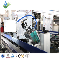 Machine de remplissage automatique électrique de boissons en PET 5L haute précision avec pompe PLC et structure rotative pour ligne de production de bouteilles