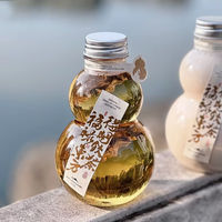 Bouteille en plastique transparent jetable en forme de gourde pour la boisson froide de l'animal de compagnie
