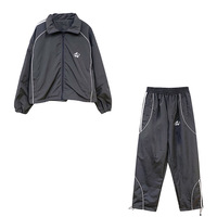 Ensemble de survêtement unisexe streetwear décontracté printemps coupe-vent avec veste zippée à col montant et détails réfléchissants, et pantalon de jogging 2-en-1