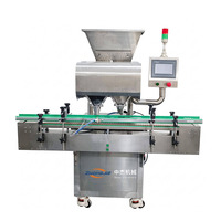 Machine de comptage entièrement automatique à 16 canaux de haute précision pour comprimés et bouteilles, 20-80 bouteilles/minute, 220V/110V, facile à utiliser