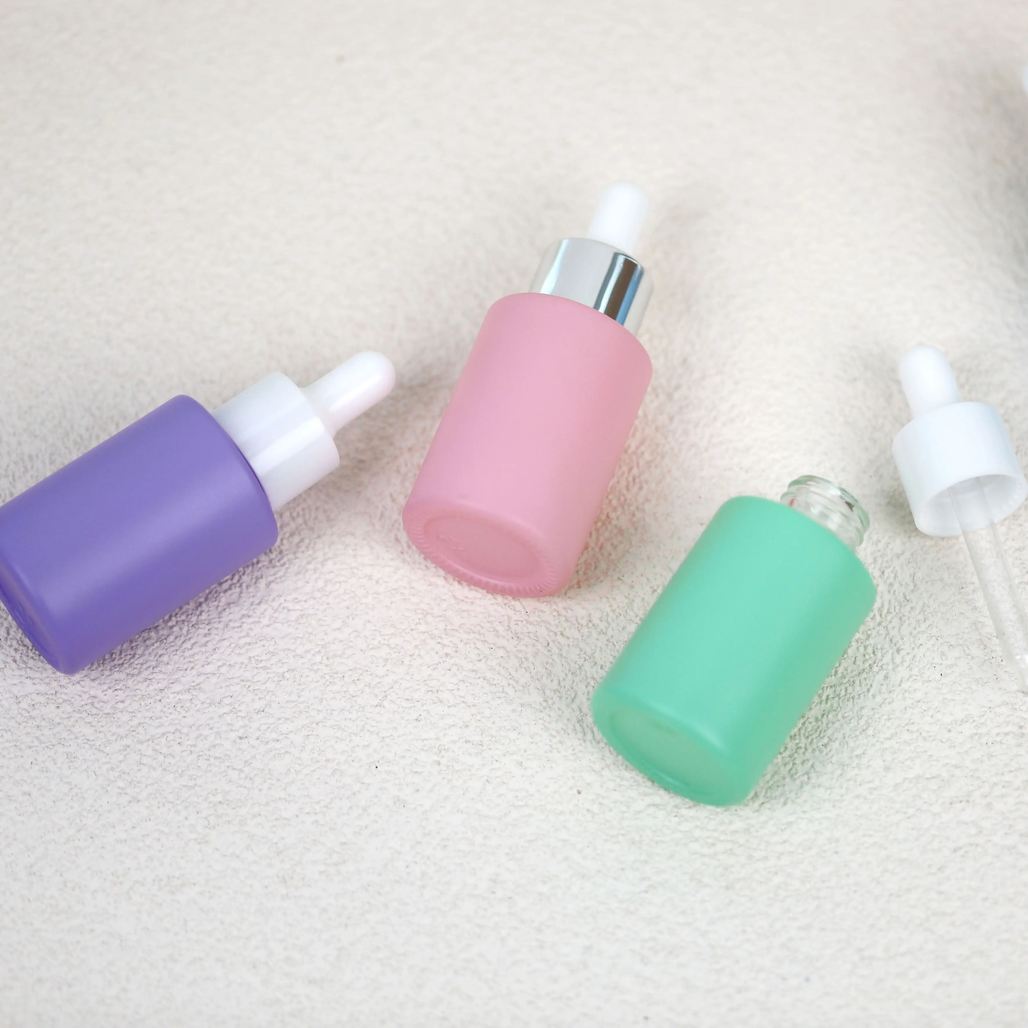 High Quality Blue Green Pink Frosted 30Ml 50Ml Flat Shoulder Cylinder Glass Dropper Bottle For Serum Essential Oil