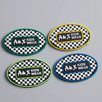 Prix d'usine Logo personnalisé Patch en caoutchouc de silicone souple 3D PVC/TPU Etiquette de vêtement pour sacs et vêtements Type plié
