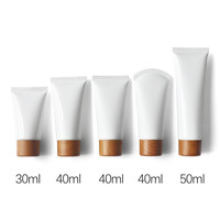 Tube souple cosmétique 30/40/50 g/ml avec capuchon effet bois ; Distributeur de crème pour les mains, nettoyant visage, lotion ; Bouteille en plastique vide fabriquée en Chine