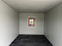 Maisons préfabriquées en conteneurs de 10 pieds à aspect bois, maisons miniatures de 20 pieds, toilettes portables personnalisables pour les chantiers de construction extérieurs