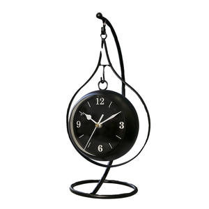 Horloge d'art en fer créative minimaliste, ornement silencieux, adaptée à la décoration du salon, affichage de table, style nordique de luxe léger. - Product Image 1