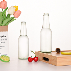 Ru Star 330ml Claro <span class=keywords><strong>Precio</strong></span> barato Botellas de cerveza de vidrio vacías personalizadas transparentes con tapas - Product Image 5