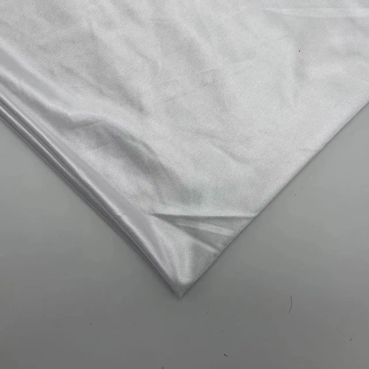 China Suppliers 100% Polyester Tricot Knitting Shiny Fabric Warp Dazzle Fabric