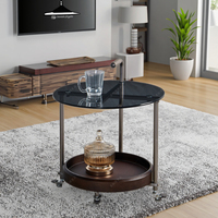 Table basse moderne en verre trempé avec pieds en métal |   Table basse ronde à roulettes avec système de poussée et de traction