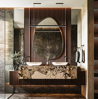 Meuble-lavabo flottant de luxe personnalisé avec miroir LED rétroéclairé irrégulier, vasque noire en pierre frittée et design cannelé, idéal pour hôtels