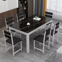 Ensemble de salle à manger moderne et minimaliste noir, pieds en fer, plateau en pierre frittée, écologique, durable, 6 places, pour salon