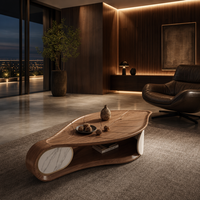 Table basse en noyer courbée de style minimaliste italien, table à cocktail de luxe en forme de feuille avec accent en marbre pour la maison et l'hôtel