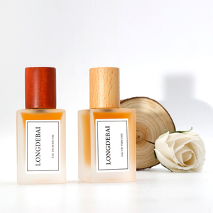 Luxury New Frosted Crimp Rectangle Empty <b>Perfume</b> Bottle 30ml 50ml 100ml Glass <b>Perfume</b> Spray Bottle with Black Wooden Cap - Product Image 1