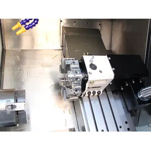 Precision Slanting Bed Cnc Lathe Machine Auto Feeder Torno Cnc Fanuc Machinery Industrial Metal Cnc Lathe Tck40