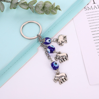 Porte-clés vintage en alliage de zinc avec motif œil porte-bonheur, breloques pour voiture et sac, petit pendentif éléphant en verre, porte-clés porte-bonheur, vente en gros