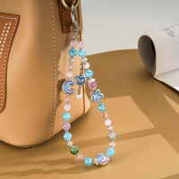 Chaîne de téléphone portable pour poignet avec pendentif en perle en forme de cœur, étoile et lune bicolores, breloque anti-perte haut de gamme pour téléphone mobile