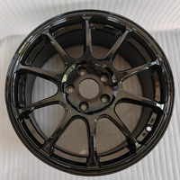 Jantes en alliage d'aluminium à rayons multiples 17x7.5 de 40 mm, finition noire intégrale, caractères fraisés en cuivre antique, lisses et neuves, garantie 3 ans