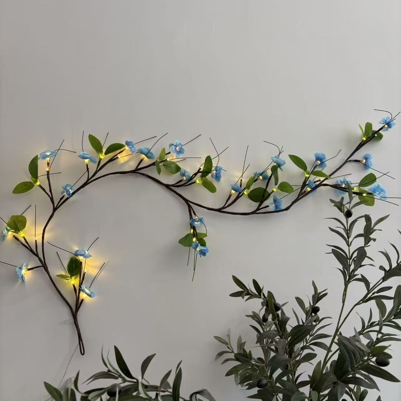 Vert à fleurs bleues