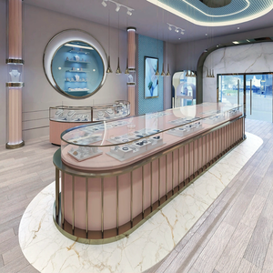 خزانة عرض للمجوهرات بخطوط منحنية وزخارف معدنية أنيقة، لوحة وردية غير لامعة + زجاج شفاف - Product Image 1