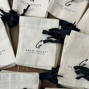 Customized Cotton Earing Ring Jewelry Packaging Bag Organic Cotton <b>Drawstring</b> <b>Pouch</b> Small Muslin Cotton Bag With Black Ribbon - Product Image 1