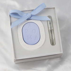 FinRu, venta al por mayor, armario colgante ovalado para coche, ambientador aromático, difusor de aceite esencial de porcelana con flor de cerámica perfumada - Product Image 1