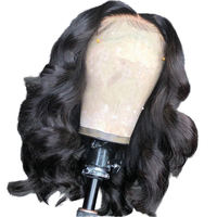 Perruque de cheveux bouclés mi-longs pour femmes Perruque en fibres chimiques légèrement ondulées avec styles longs tressés ondulés