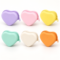 Pochette de rangement portable en silicone en forme de cœur, avec fermeture éclair, pour câbles, cosmétiques et articles essentiels quotidiens
