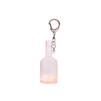 OEM ODM Nouveau design Vente en gros Personnalisé Mini porte-clés liquide créatif en acrylique motif dessin animé avec flotteur 3D, paillettes et alliage