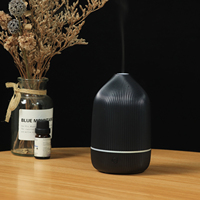Diffuseur d'arômes lumineux à sept couleurs transfrontalier, diffuseur domestique de bureau enfichable, atomiseur et humidificateur