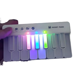 Wholesale 15 Keys Portable Electronic Piano Keyboard Mini Pocket Piano With Colorful Light Musical <b>Instrument</b> Toy For Kids - Product Image 1