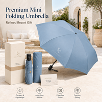 Mini parapluie pliant compact manuel ouverture/fermeture en pongee 190T coupe-vent avec baleines en fibre de verre, idéal comme cadeau de bienvenue pour les clients d'hôtels et de complexes hôteliers