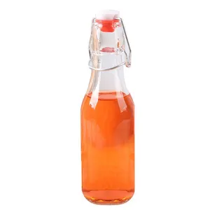 Стеклянная бутылка с прозрачной откидной крышкой