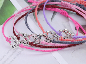 Bracelet en cordon ciré tressé avec empreintes de pattes de chat et de chien, accessoire minimaliste et polyvalent pour femme, best-seller - Product Image 5