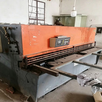 Kullanılmış Çok Fonksiyonlu Hidrolik CNC Kesme Makinesi Metal Levha Sabit Uzunlukta Kesme Makinesi Asansör Kabin Kapısı İşleme İçin