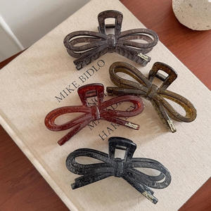 Nouvelle pince à cheveux creuse en forme de nœud, grande pince requin en plastique pour femmes, vente en gros - Product Image 1