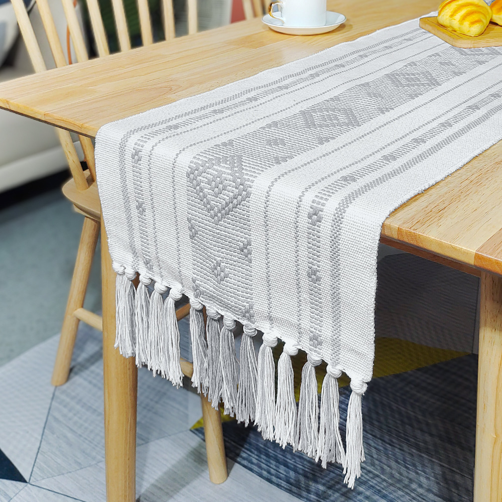 Runner da tavola con nappine a diamante singolo bianco e grigio