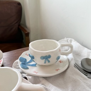 Fábrica Direta Ins Estilo Em Relevo Bow Copo De Café De Cerâmica Branca e Pires Set para Atacado Porcelana Tarde Chá Copos Prato - Product Image 2