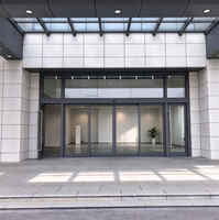 Porte coulissante automatique extérieure durable avec cadre en alliage d'aluminium, système de porte coulissante pour entrée de bâtiment commercial