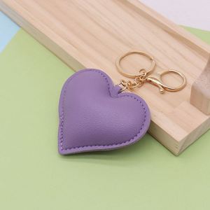 PU <b>Leather</b> Light <b>Keychain</b> Charm Fashionable Heart-Shaped Embossed Cute Valentine's Day Pendant for Women Key Chain - Product Image 4