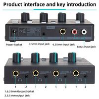Amplificateur de casque professionnel mini 4 canaux noir avec boîtier métallique, entrée ligne et adaptateur d'alimentation externe pour usage domestique/club