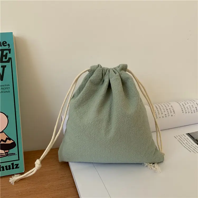 Çevre dostu Muslin pamuk keten hediye küçük kese özelleştirilmiş kanvas ipli çanta