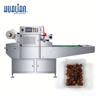 Automatische MAP Tray Sealing Verpakkingsmachine Hualian HVT-A voor dadels, gedroogd fruit, en verpakkingslijn met gemodificeerde atmosfeer
