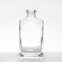 Bouteille de spiritueux en verre transparent de luxe de 700 ml et 750 ml pour whisky, gin, rhum, fabricant de bouteilles en verre sur mesure OEM