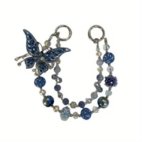 Breloque de téléphone papillon bleu foncé avec gros strass et perles, lanière de poignet pour sac, bijou artisanal lourd, cadeau pour femme