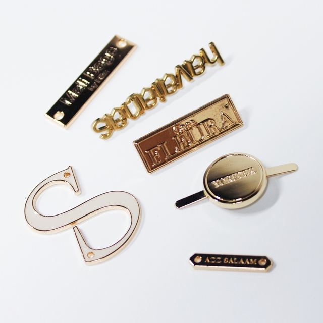 Wholesale Custom Brand Logo Clothing Tag Accessories Laser Cut Eco-Friendly 3D Embossed Metal Labels Fashionable Digital Garment