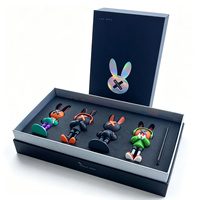 Boîte cadeau rectangulaire rigide de luxe avec doublure en éponge noire, impression quadricolore découpée au laser pour l'emballage de jouets de collection