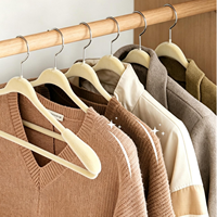 Cintres en plastique floqués en velours épaissis à épaules larges, antidérapants, pour costumes, manteaux en laine, armoire et usage domestique - Vente en gros