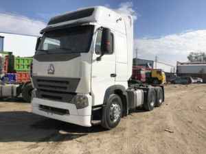 Camion tracteur HOWO A7 d'<span class=keywords><strong>occasion</strong></span> de haute qualité à prix avantageux, cabine à deux lits, camion diesel poids lourd de première qualité - Product Image 1