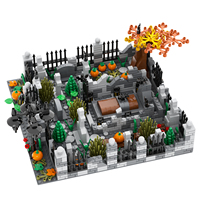 Ensemble de blocs de construction sur le thème de l'Halloween : cimetières, tombes, têtes de citrouille, croix et jouets inclus