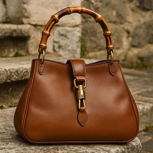 Sac à main de luxe en cuir de vachette pleine fleur avec un coloris marron rétro, une poignée en bambou unique et une boucle de fermeture métallique, pochette de haute qualité - Product Image 4