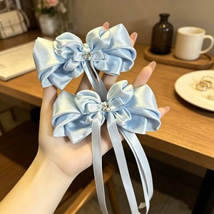 A super cute orchid flower hair <b>clip</b> with a resort vibe, perfect for elegant bangs and a sweet new hair accessory to match your - Product Image 2